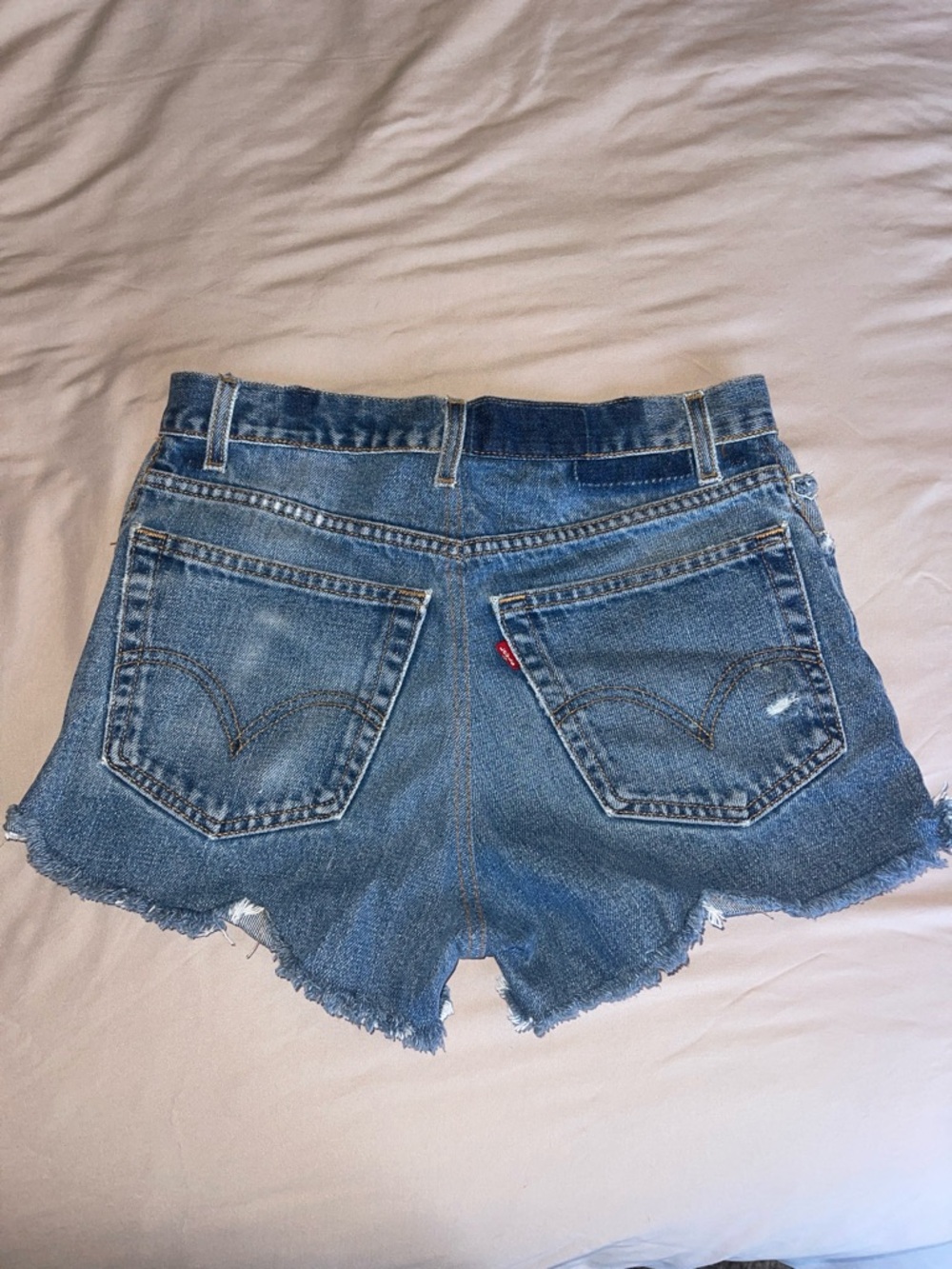 Levi's Distressed Medium Blue Denim Cutoff Shorts - Women size 24/25